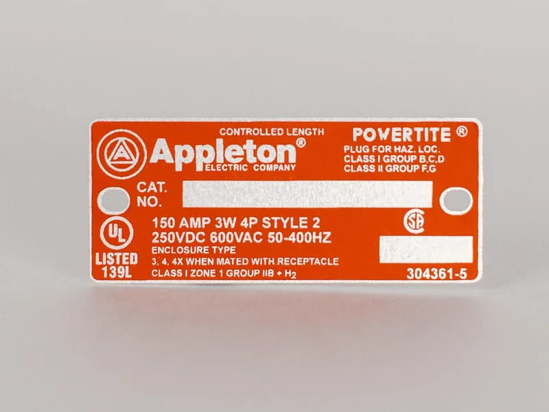 An orange Appleton Powertite receptacle data plate