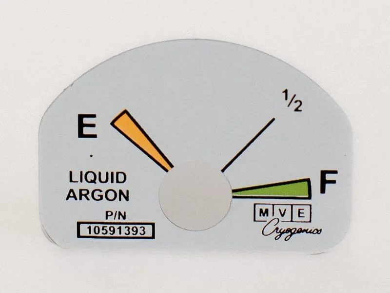 A liquid argon gauge-face overlay with printed colored needles