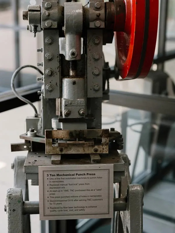 The 3-ton mechanical punch press Texas Nameplate bought used in 1946, now on display