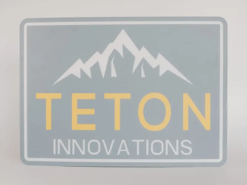 A Teton Innovations logo decal with a mountain graphic